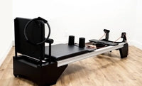 Thumbnail for IM=X® Xercizer Heavy-Duty Pilates Reformer - LUXUSFIT Luxury Exercise & Recovery Equipment