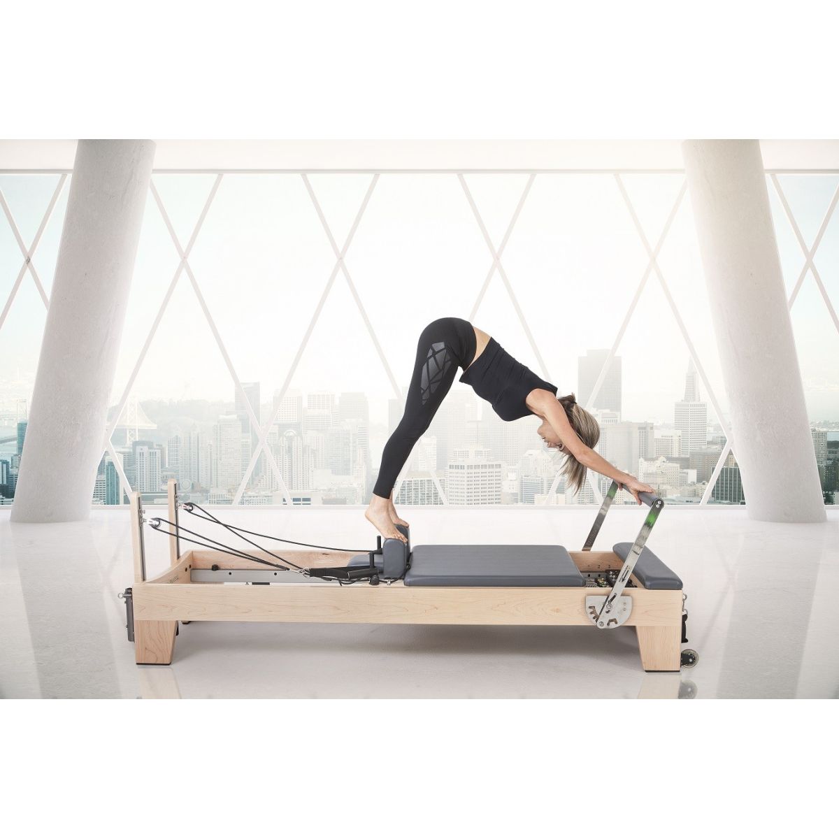 Reformer de madera con torre Elite